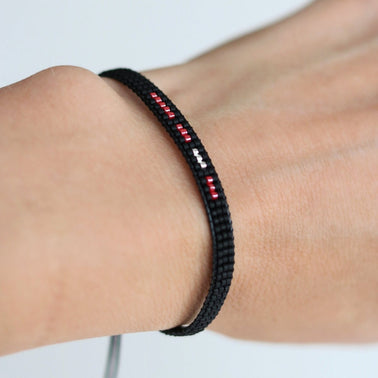 morse code bracelet with red and white dots