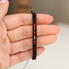 morse code bracelet with red and white dots